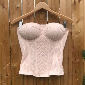Light pink lacey corset by Charlotte Russe